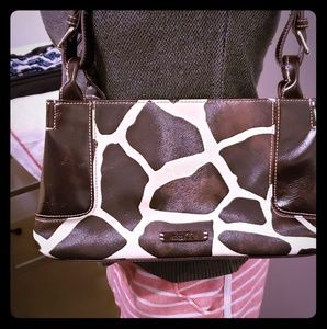 9 and Co faux giraffe print purse.